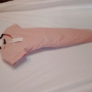 T-shirt dress. Sooo cute!! Has straps to tie however you like. Great dress!!